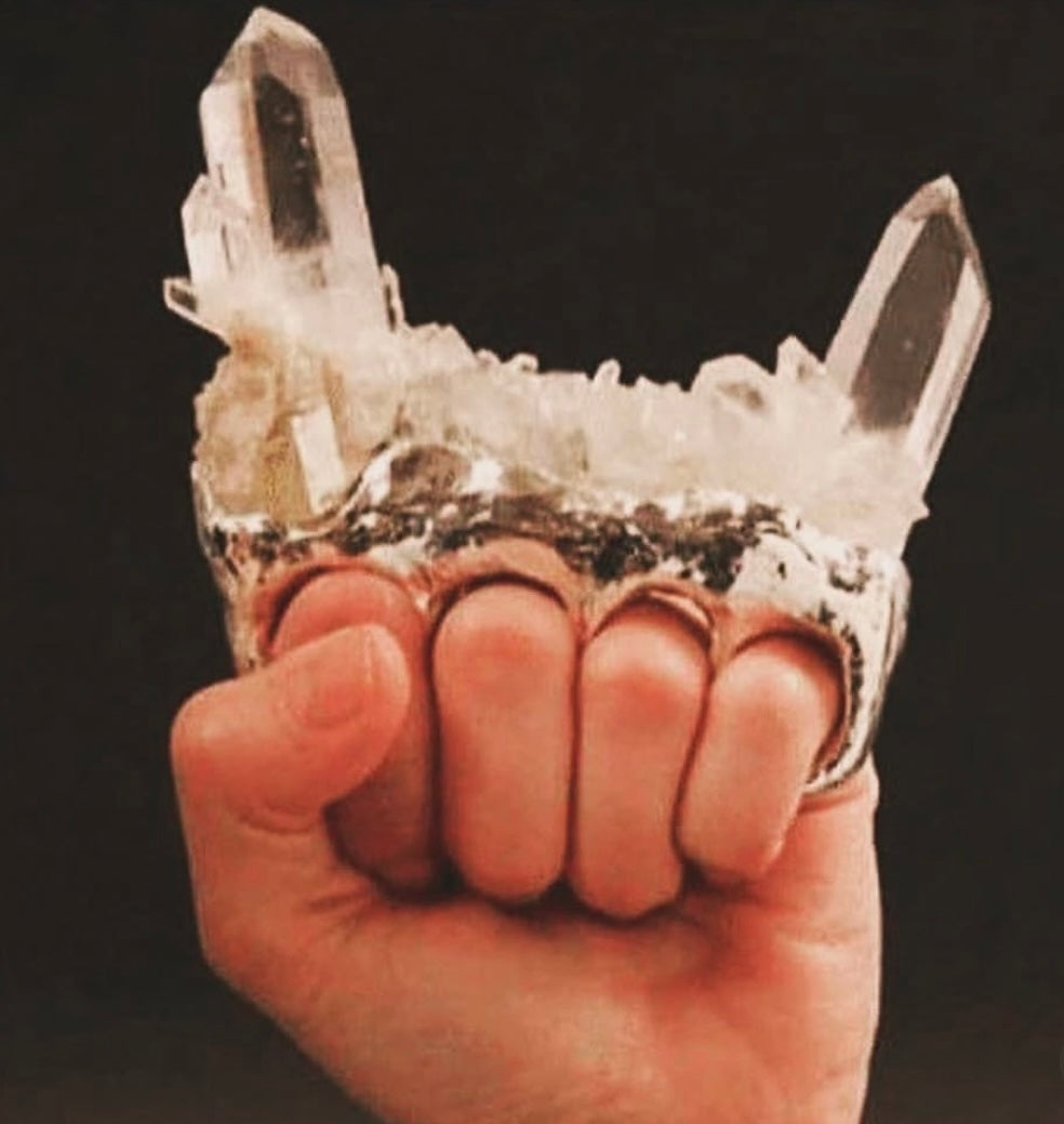 Hand wearing selenite crystal ring