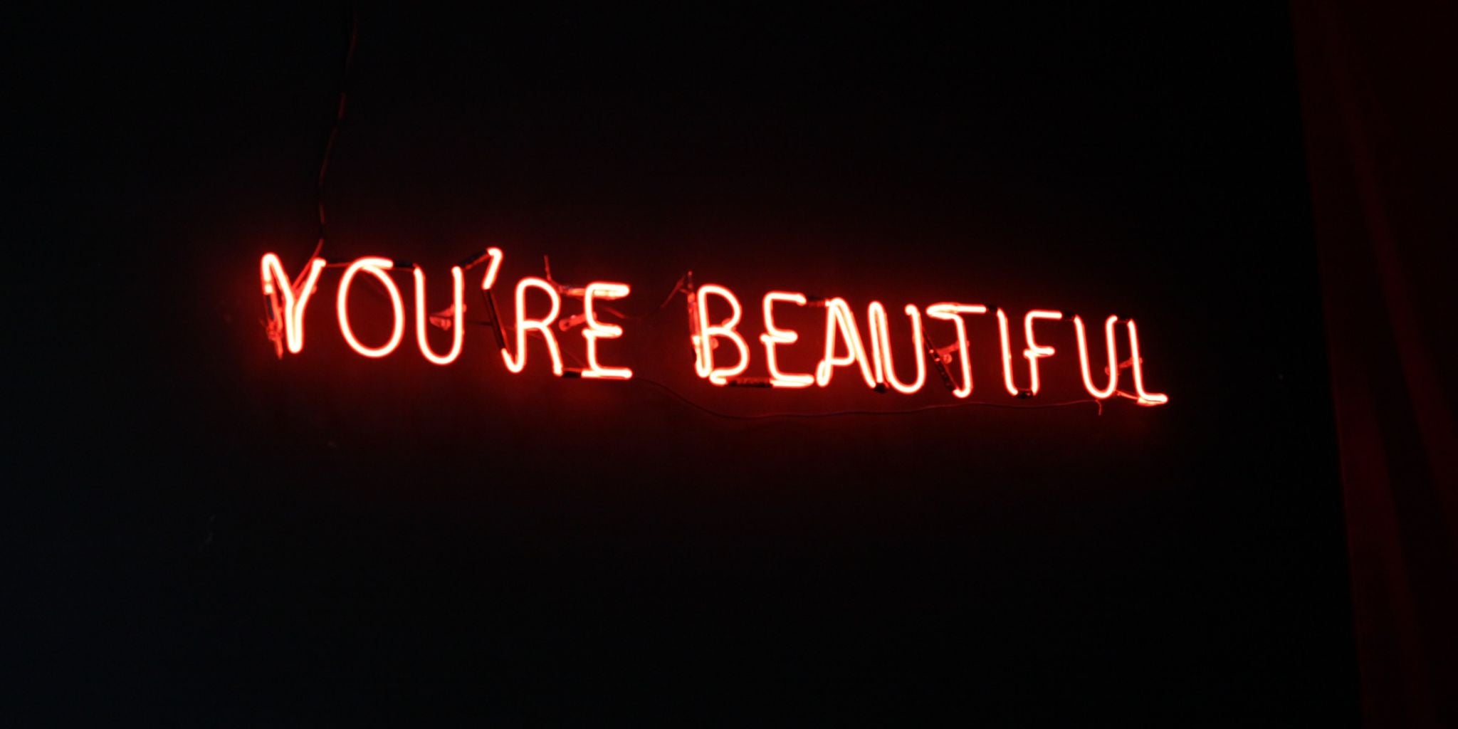 Neon sign saying your beautiful