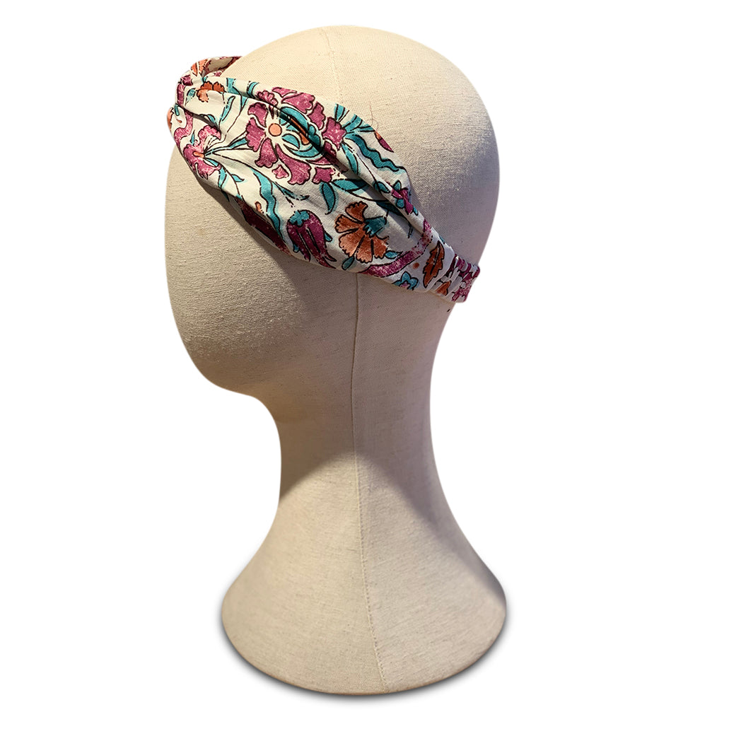 Pesta cotton turban style headband on mannequin