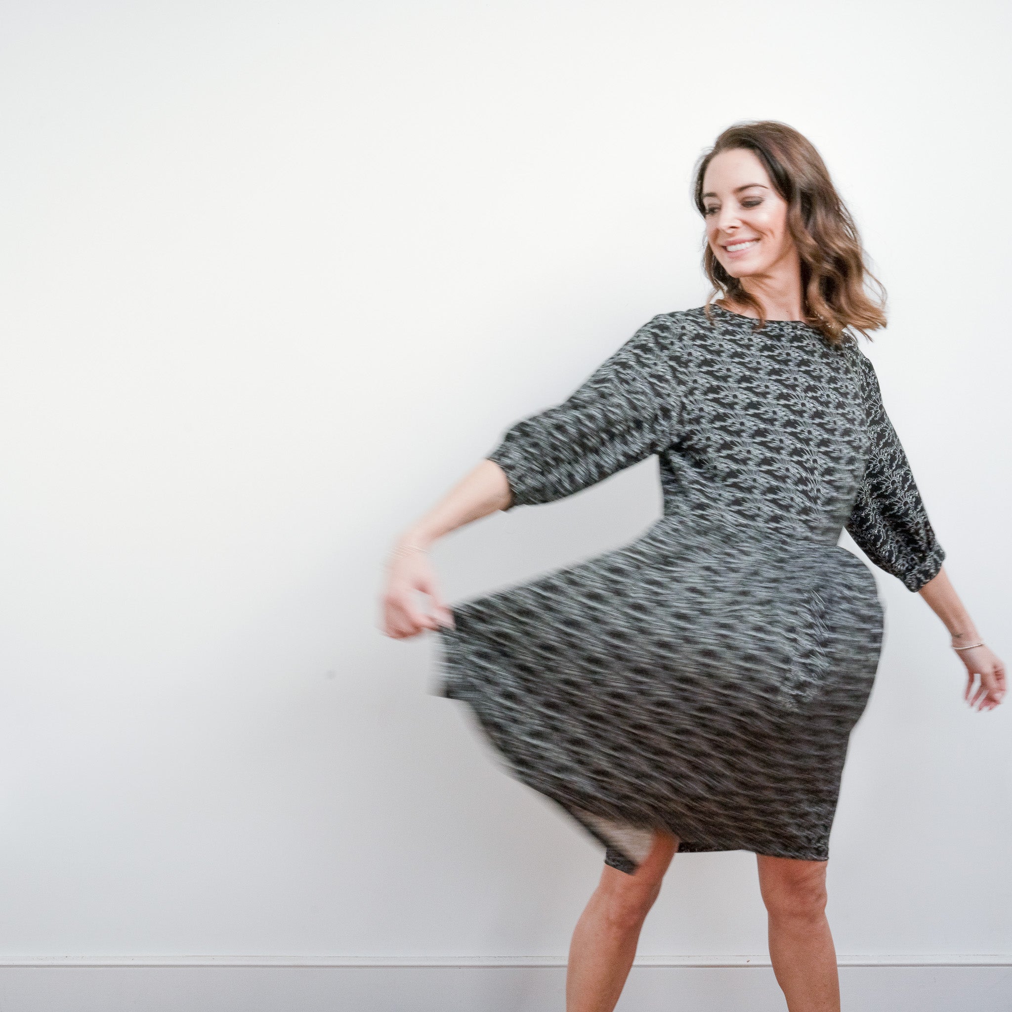 Woman in Vaata - Monochrome Linear Print Skater Style Midi Dress