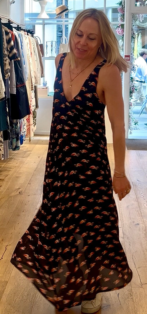 Woman wearing flamingo printed dress
