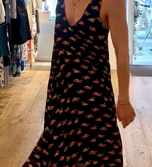 Woman wearing flamingo printed dress