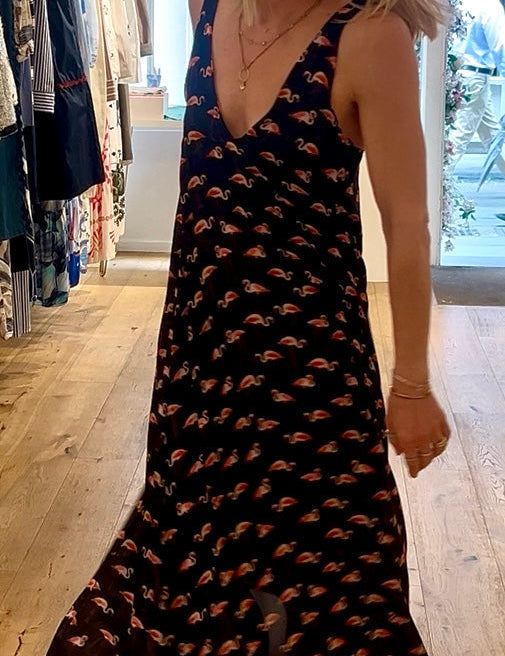 Woman wearing flamingo printed dress