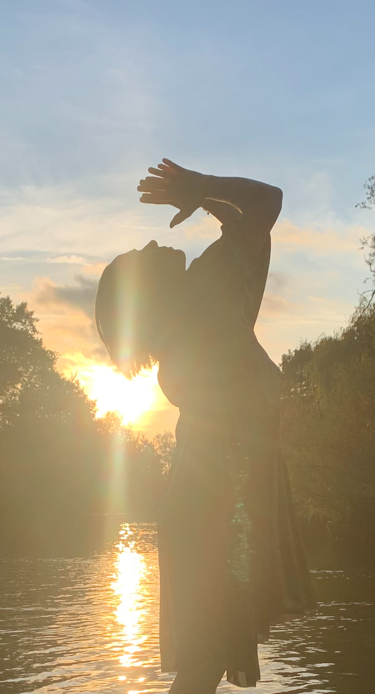 rebecca in gold ausus at sunset alexandra palace