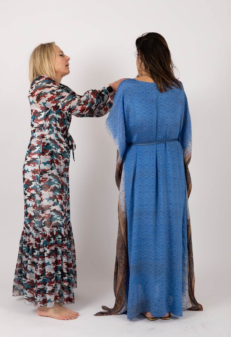 Rebecca wearing ilu in sunset camo dressing Camila in sarab in blue