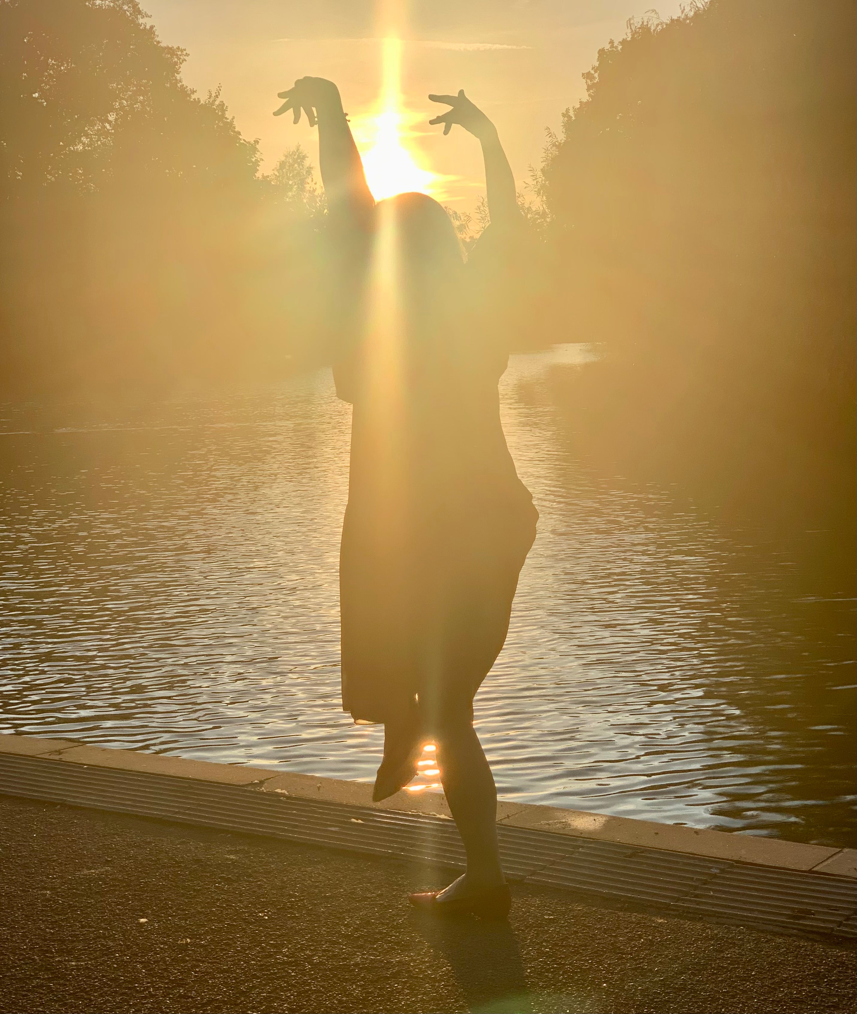 Rebecca Rodden at sunset wearing ausus in gold