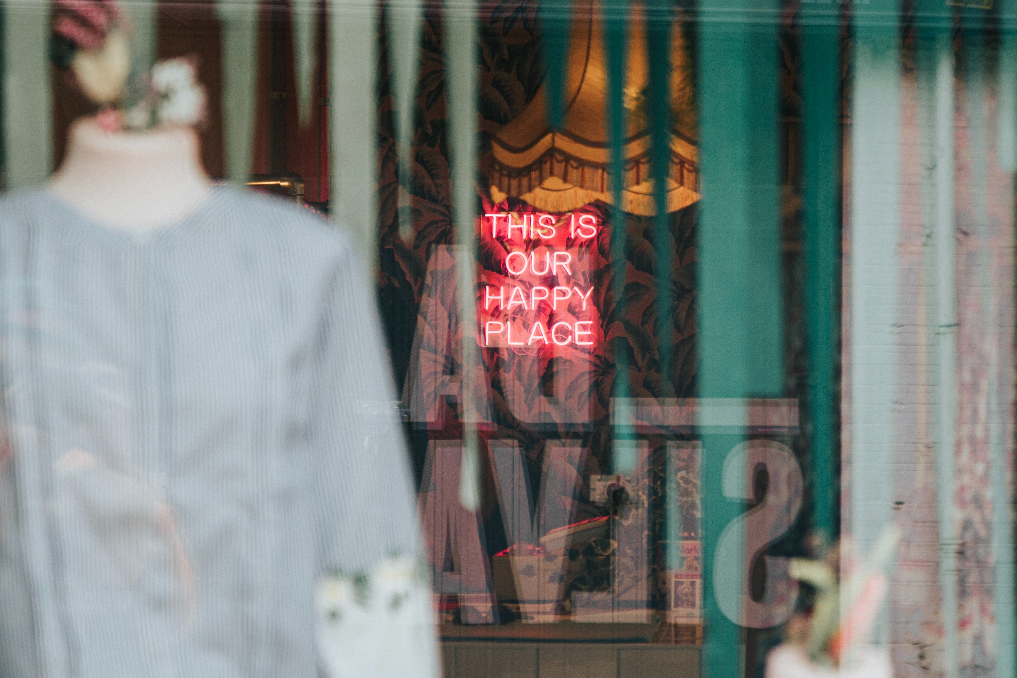 shop window with neon sign