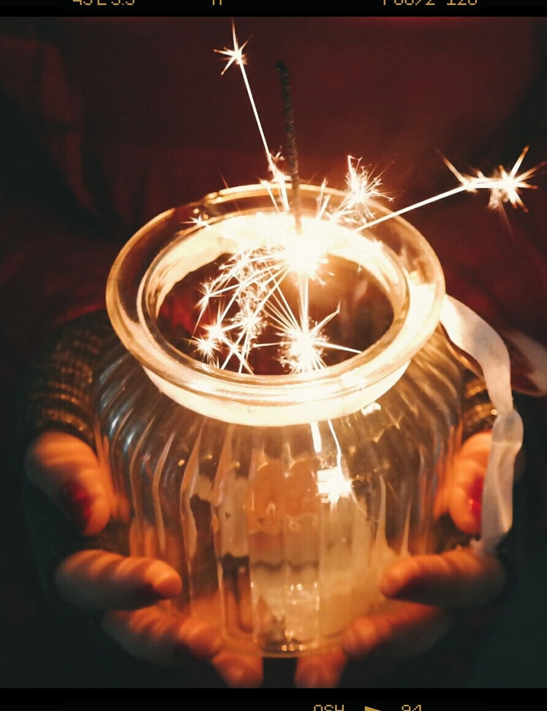 sparkler in glass jar