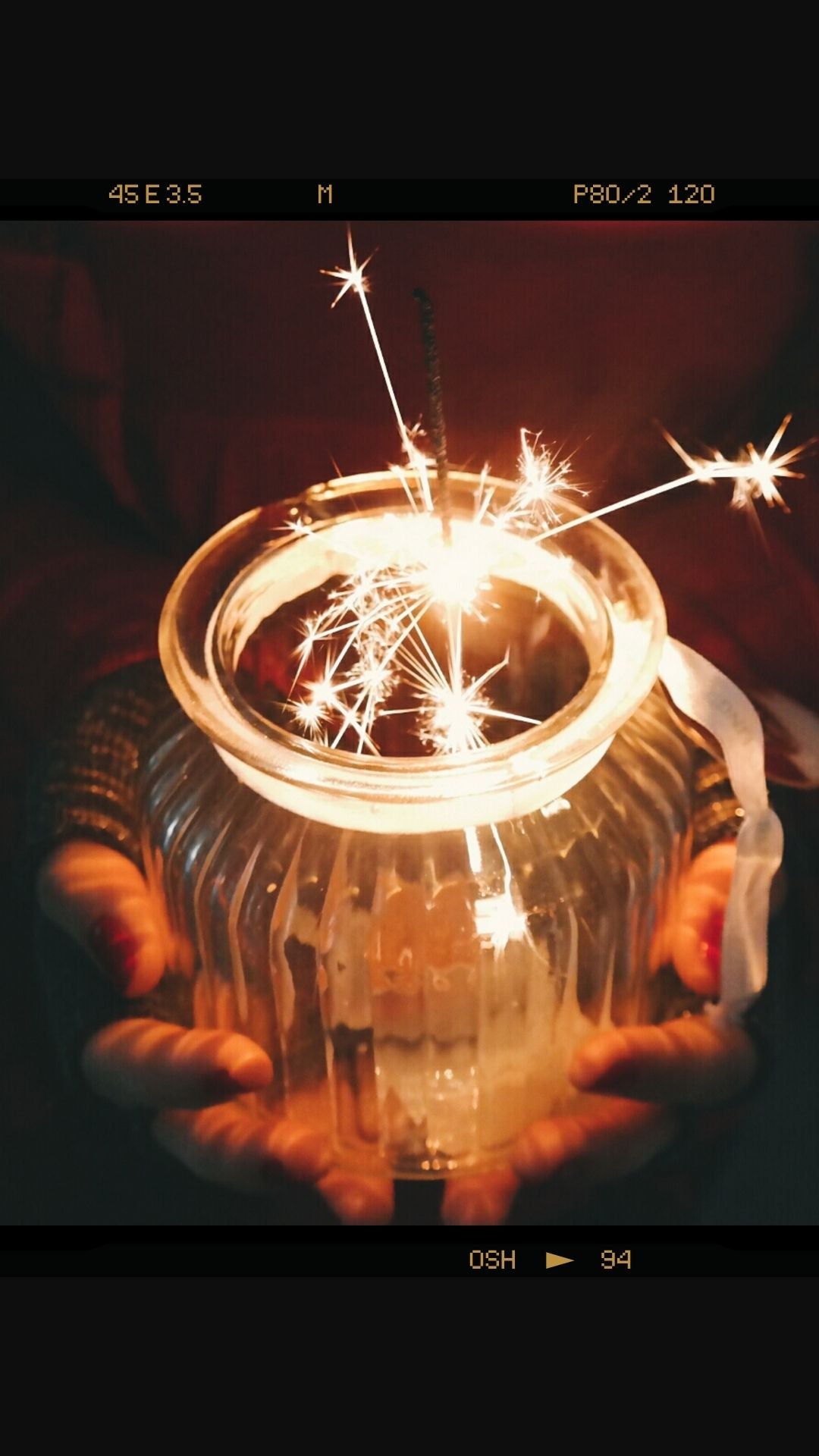 sparkler in glass jar
