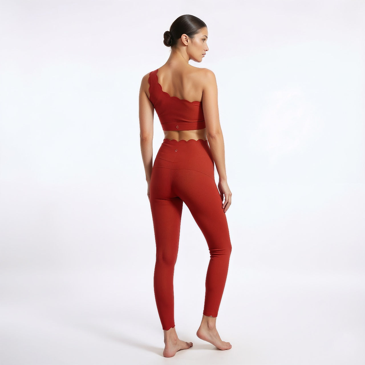 Woman wearing a red outfit on a white background