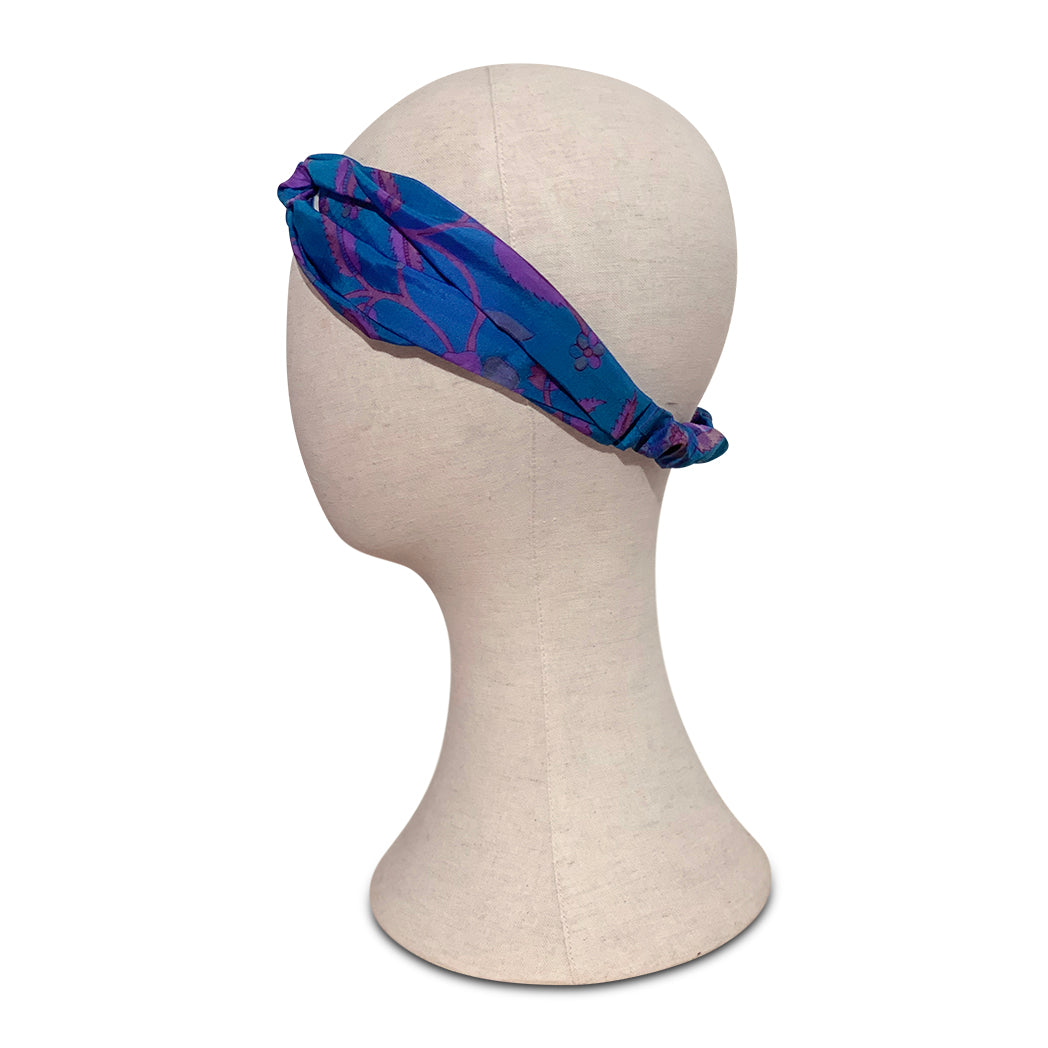 Turban headband made from blue vintage silk sari on mannequin head