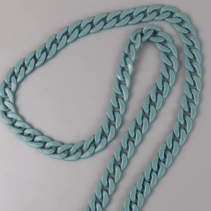 Light blue chain on a gray background