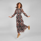 Nettie wears Ilu long sleeve maxi shirt dress in sunset camo